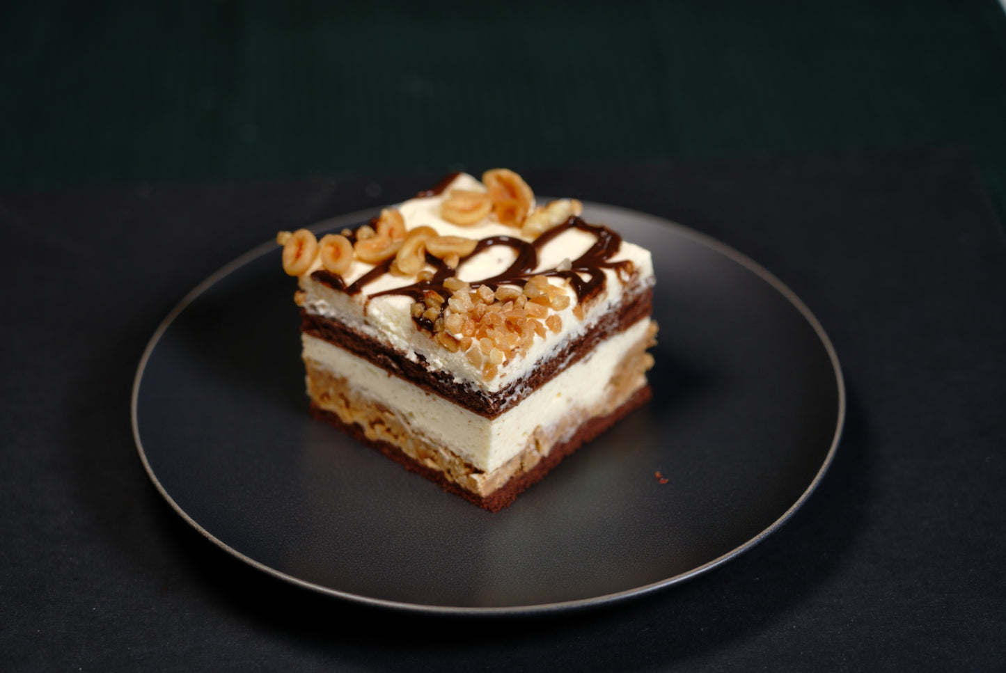 Snickers Cake  - The Happy Family Bakery